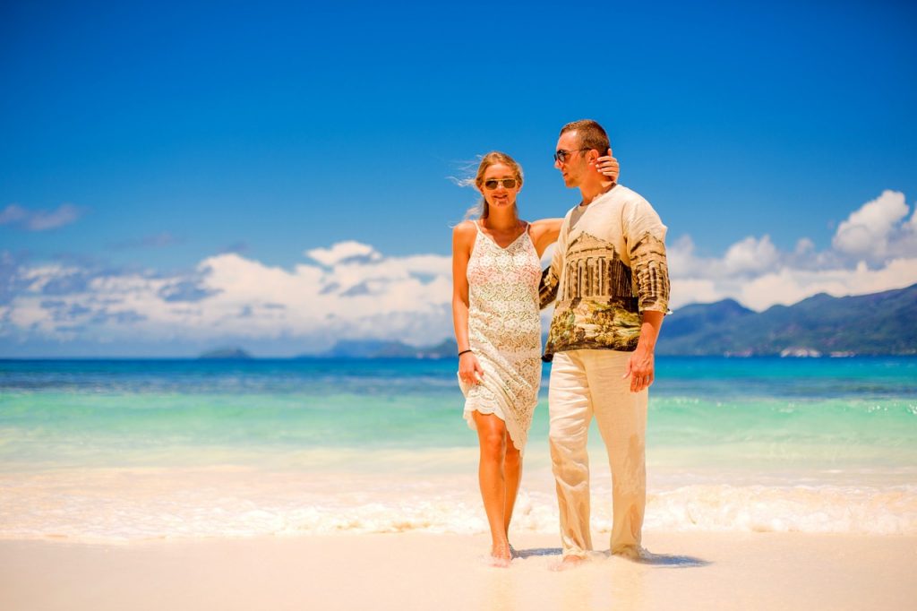 Married partners on a beach